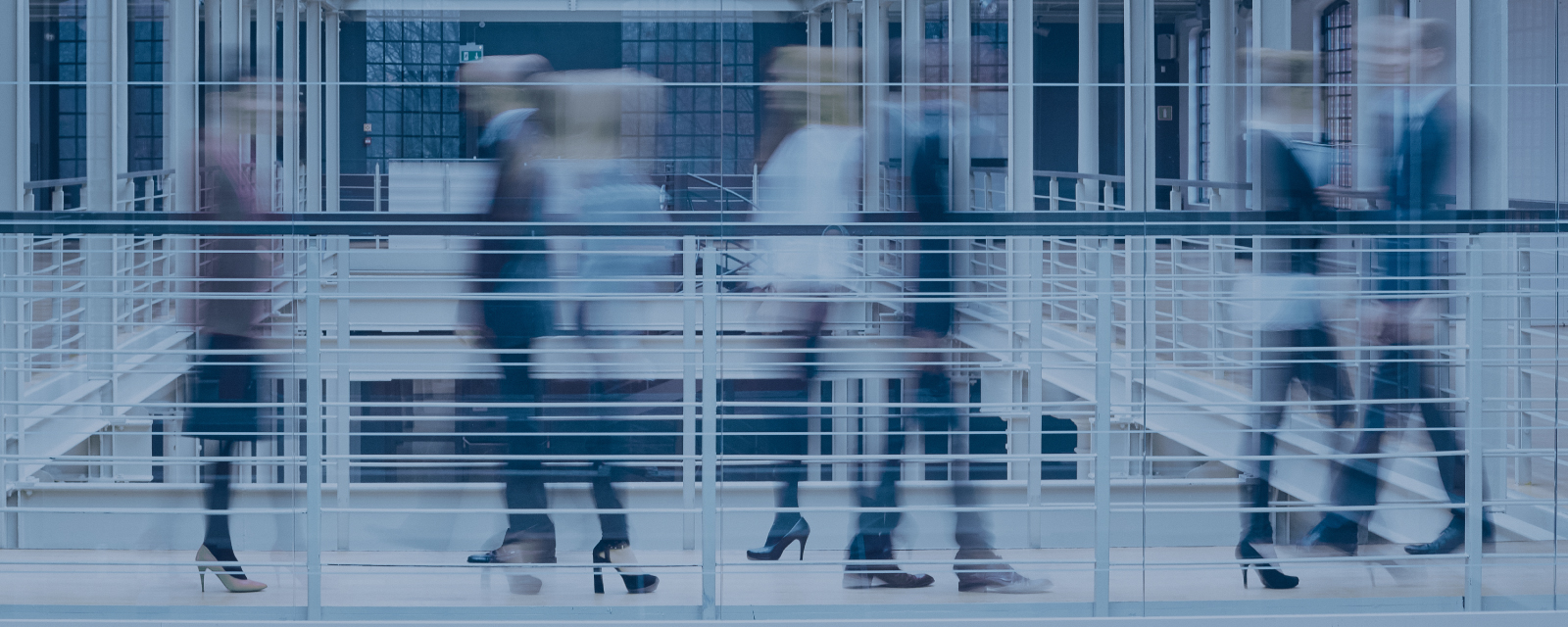 people walking in a building